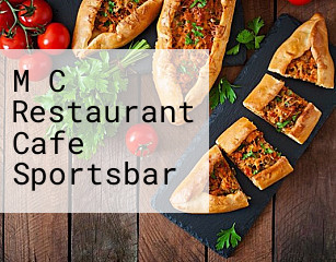 M C Restaurant Cafe Sportsbar