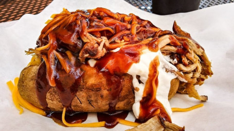 Fully Loaded Pulled Pork Baked Potato