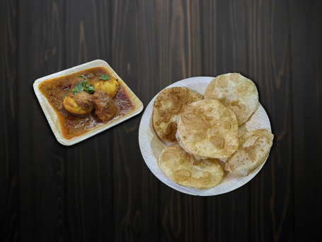 Luchi And Egg Curry [7 ,2 Pieces]