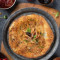 Mutton Achaari Kulcha Served With White Butter, Dal Makhani Tomato Murabba