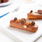 Orange Blossom, Caramelized White Chocolate And Hazelnut Eclairs