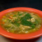 Bowl Of Chicken Broth With Veggies