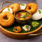 2Pc Idli , 2Pc Vada .Served With Sambher And Nariyal Chutney.