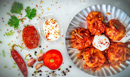 Veg Schezwan Stir Fry Momos