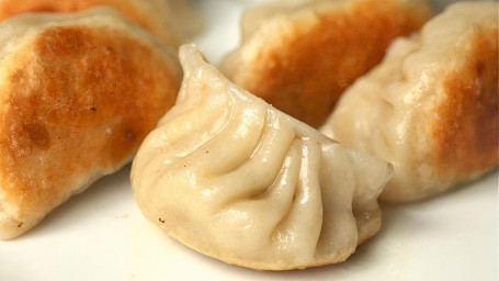 A9. Fried Pork Dumplings (6 Pcs.