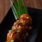 Veg Steamed Dimsum With Manchurian Sauce