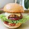 Shǒu Dǎ Hēi Sōng Lù Niú Ròu Hàn Bǎo Bāo Housemade Black Truffle Beef Cheeseburger