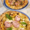 Pizza Mortadella Pistacchi Disco Regina