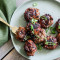 Side Meatballs With Marinara Sauce And Parmesan Cheese